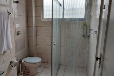 Apartamento com 2 dormitórios para alugar, 60 m² por R$ 3.690,00/mês - Gonzaga - Santos/SP