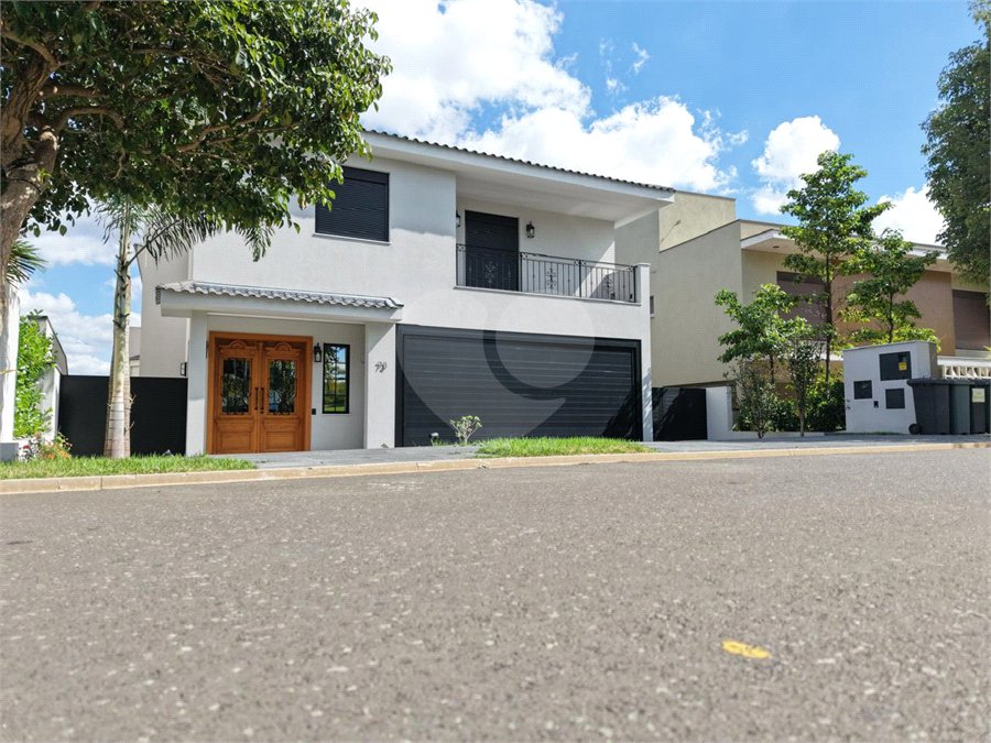 Casa à venda com 4 suítes no condomínio Alphaville Dom Pedro 3, Campinas - SP