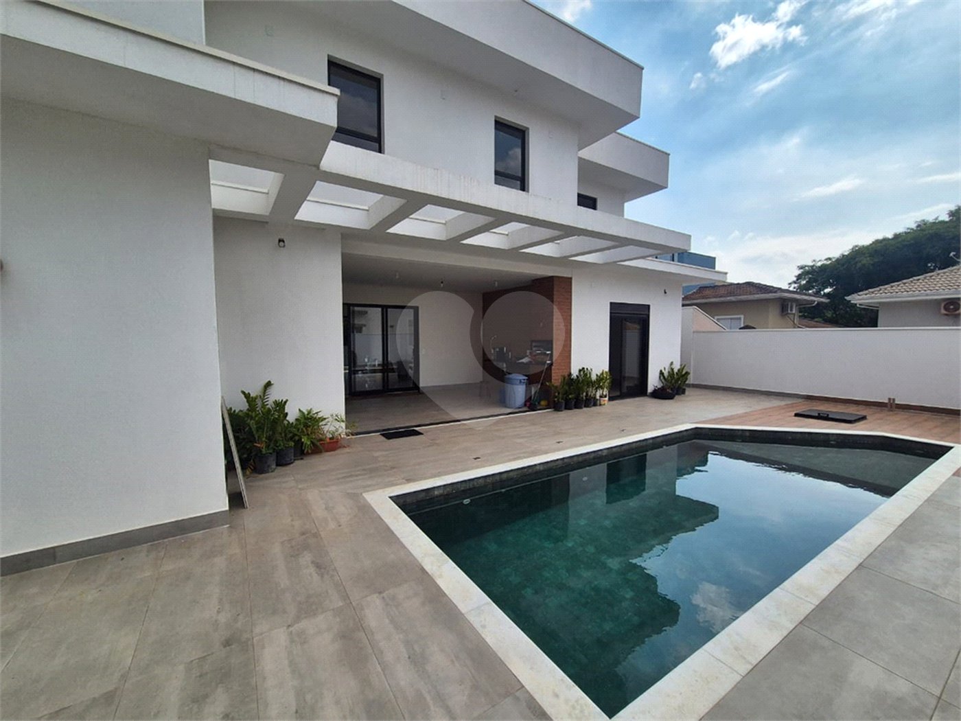 Casa à venda com 3 suítes no condomínio Terras de São Francisco, Vinhedo - SP