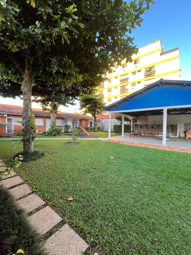 Casa com 2 dormitórios à venda, 80 m² por R$ 440.000,00 - Loteamento João Batista Julião - Guarujá/SP