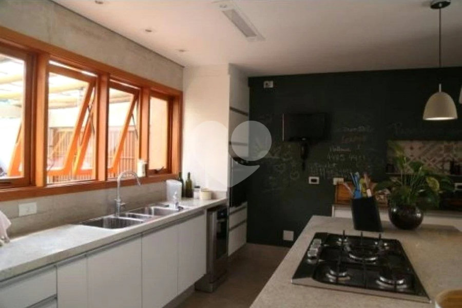 Casa à venda com 4 suítes no condomínio Suíça da Cantareira, Mairiporã - SP