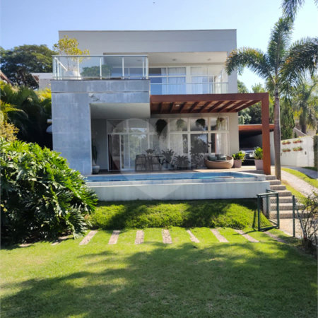 Casa à venda com 4 quartos, sendo 3 suítes, no condomínio Estância Marambaia, Vinhedo - SP