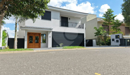 Casa à venda com 4 suítes no condomínio Alphaville Dom Pedro 3, Campinas - SP