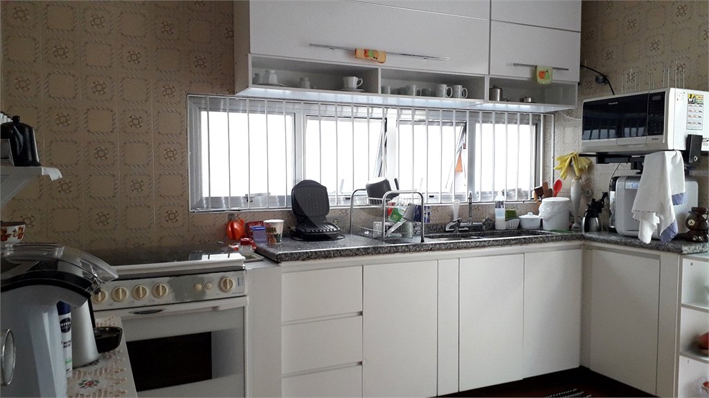 Sobrado à venda com 5 quartos, sendo 1 suíte, em Jardim Caravelas, São Paulo, SP