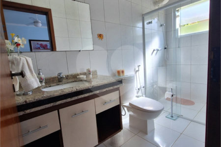 Casa à venda com 4 suítes no condomínio Bougainville, Peruíbe - SP