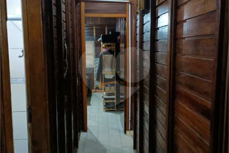 Casa à venda com 4 quartos, sendo 1 suíte,  no condomínio Morada da Praia, Bertioga - SP