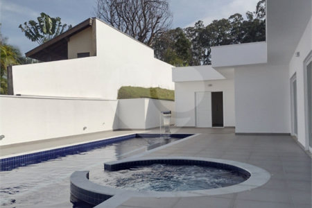 Casa à venda com 4 suítes no condomínio Estância Marambaia, Vinhedo - SP