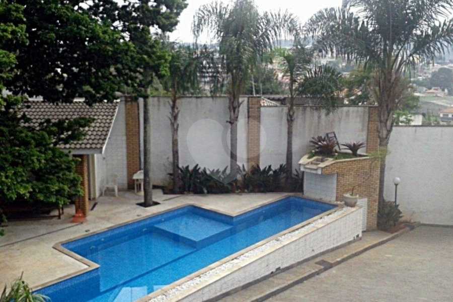 Casa à venda com 4 suítes no condomínio Residencial Reserva da Serra, São Paulo - SP