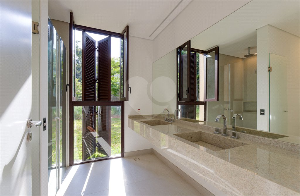 Casa à venda com 5 suítes no condomínio Chácara Flora, São Paulo - SP