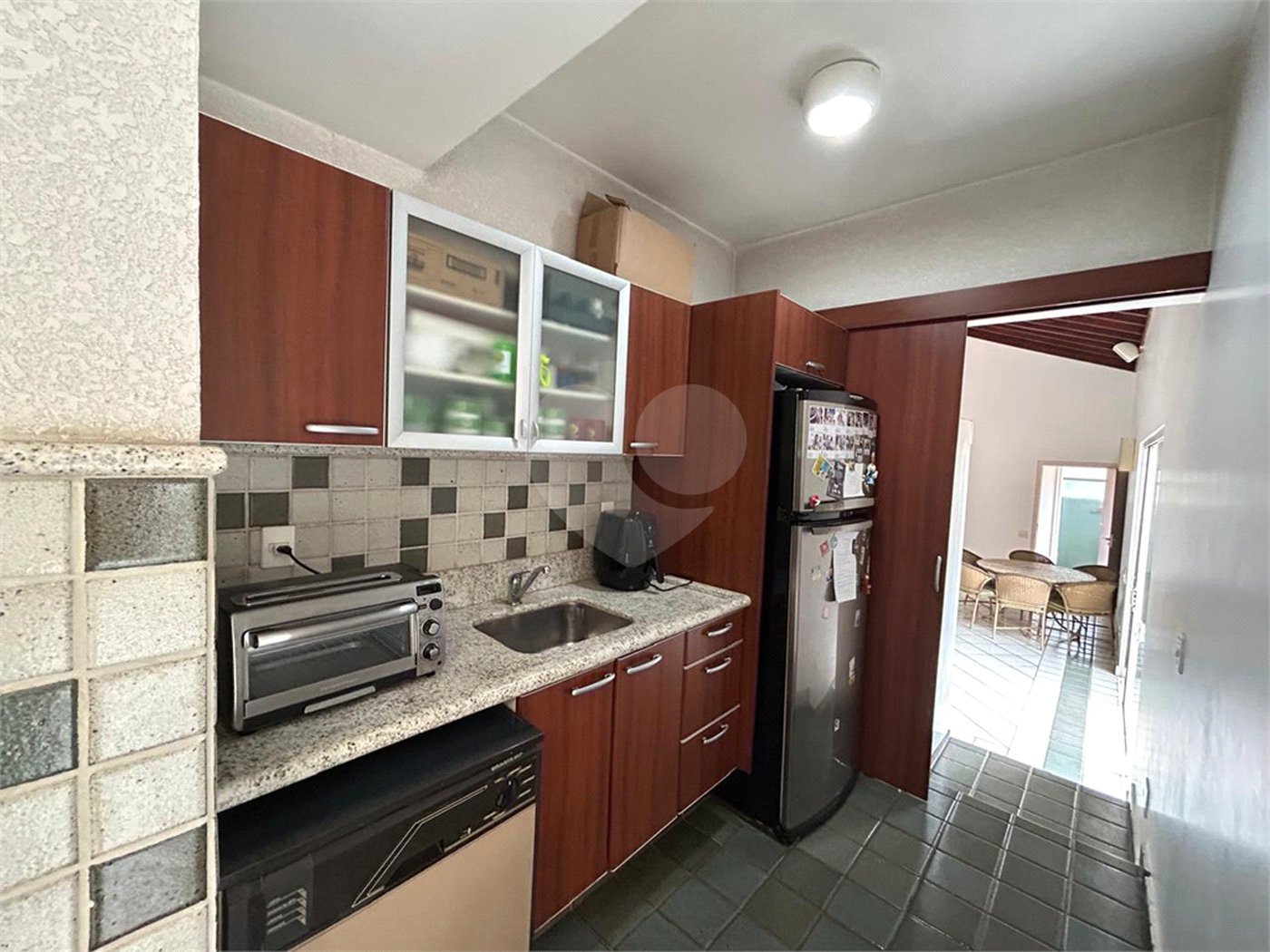 Casa à venda com 5 suítes no condomínio Residencial Bougainville, Campinas - SP