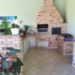 Casa à venda com 4 suítes no condomínio Bougainville, Peruíbe - SP