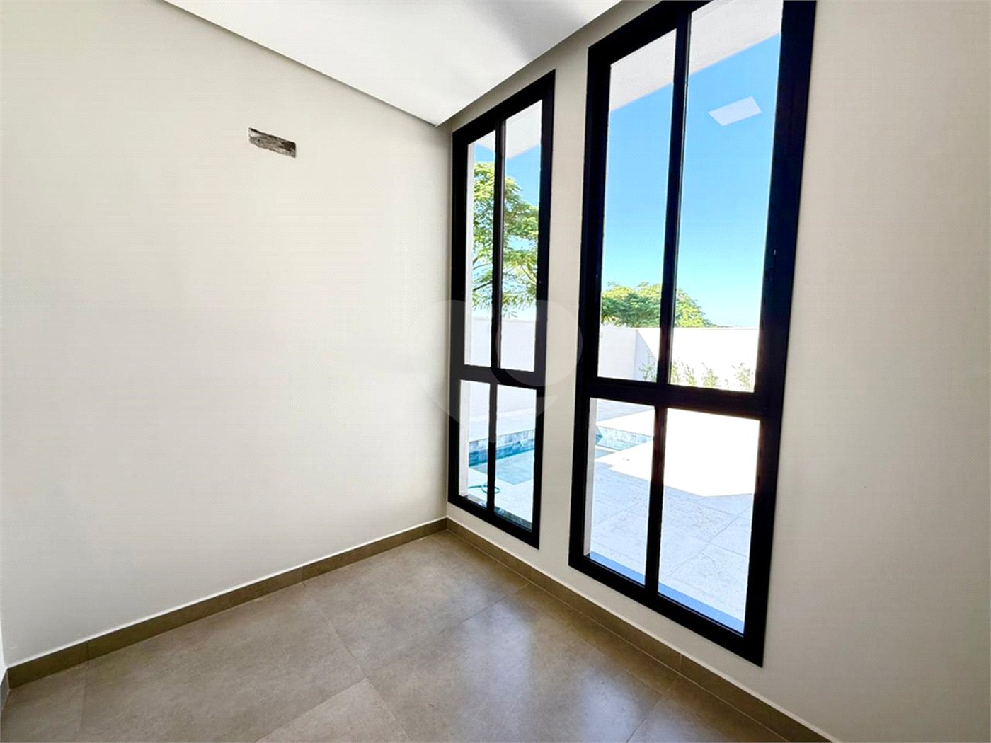 Casa à venda com 3 suítes no condomínio Villa Sapezal, Indaiatuba - SP