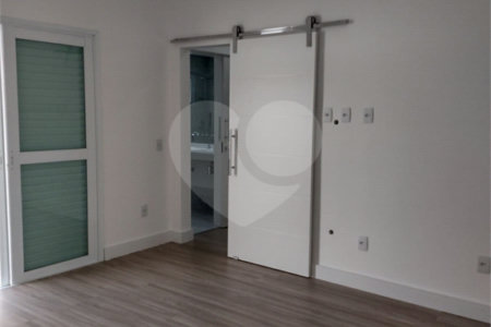 Casa à venda com 4 suítes no condomínio Estância Marambaia, Vinhedo - SP