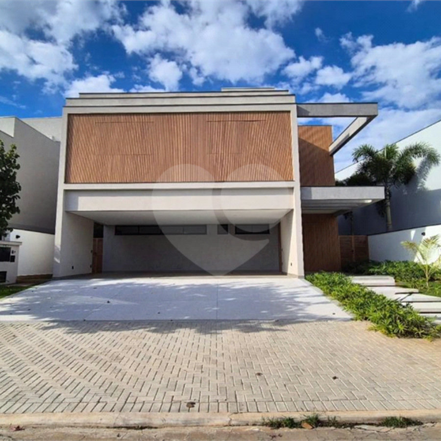 Casa à venda com 5 suítes no condomínio Alphaville Nova Esplanada 3, Votorantim - SP