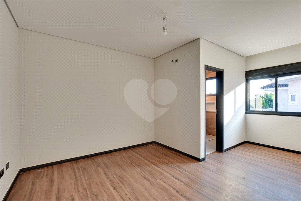Casa à venda com 4 suítes no condomínio Reserva Robélia, São Paulo - SP