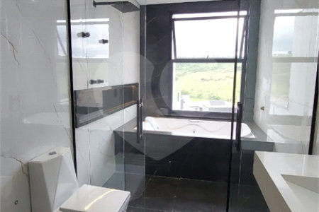 Casa à venda com 5 suítes no condomínio Figueira Garden, Atibaia - SP