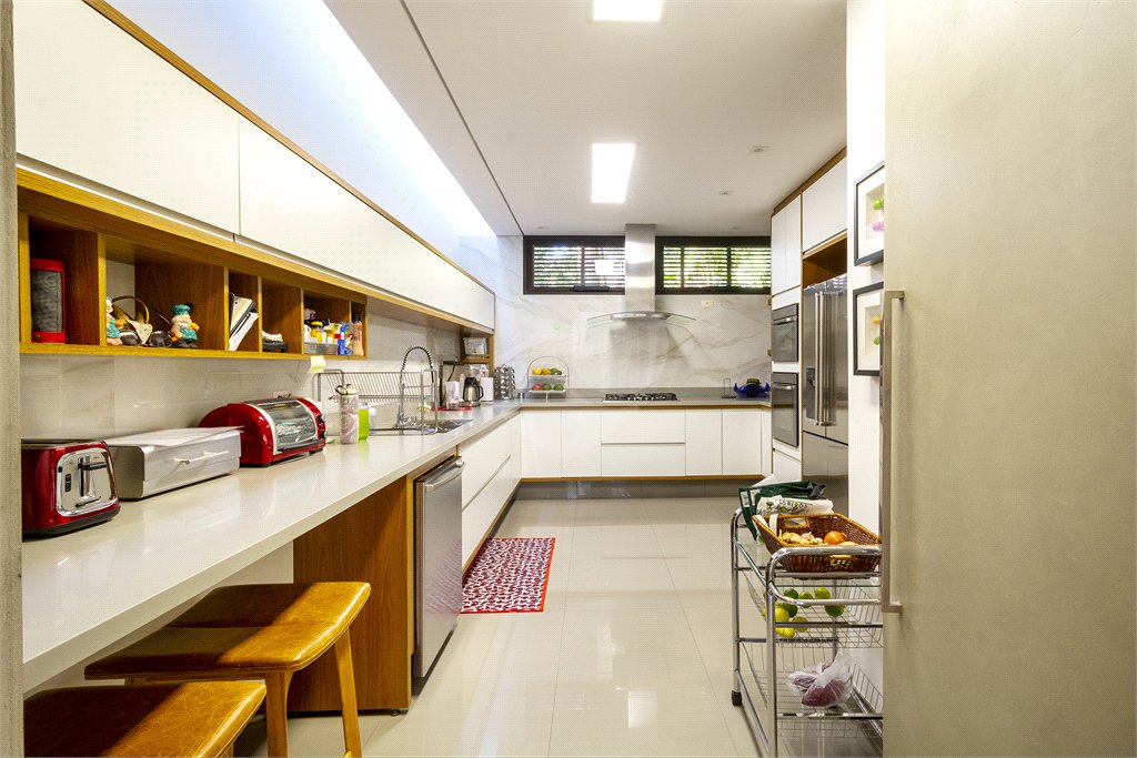 Casa à venda com 4 suítes no condomínio Vila Flora, São Paulo - SP