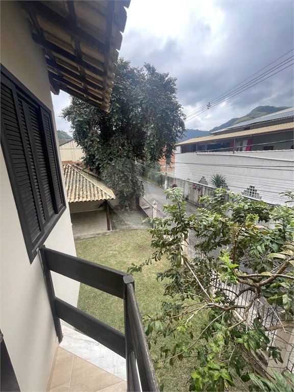 Casa à venda com 5 quartos, sendo 3 suítes, no condomínio Recanto das Palmeiras, Rio de Janeiro - RJ