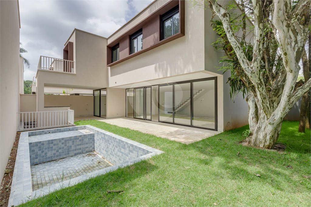 Casa à venda com 4 suítes no condomínio Garda, São Paulo - SP