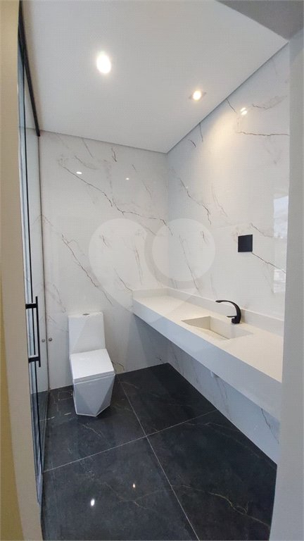 Casa à venda com 5 suítes no condomínio Figueira Garden, Atibaia - SP