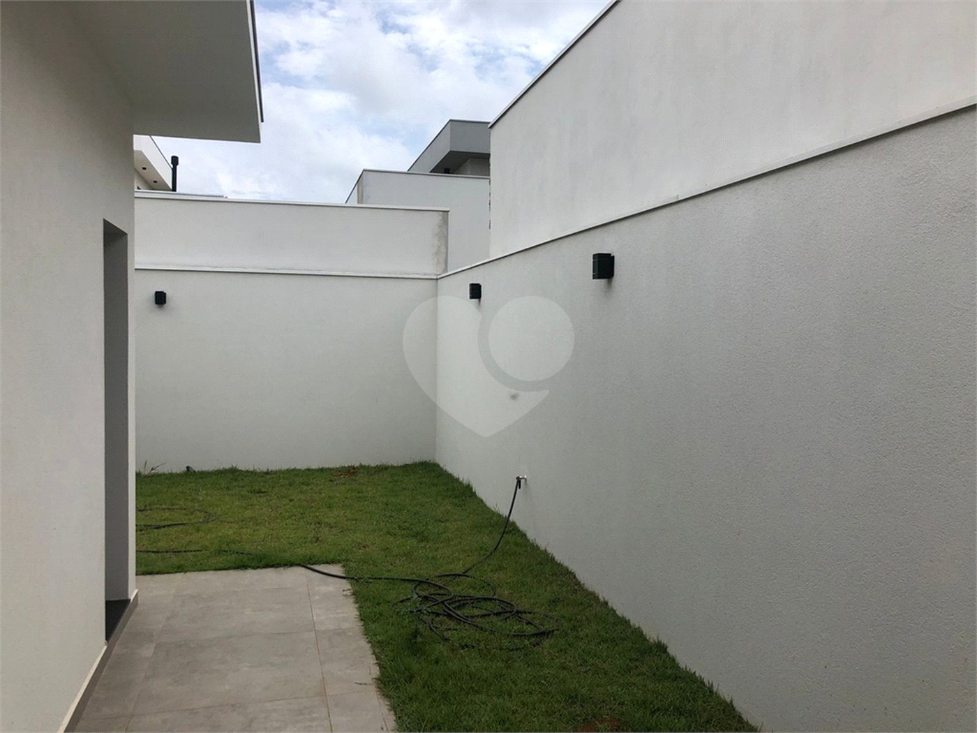 Casa à venda com 3 suítes no condomínio Parque Faber IV, São Carlos - SP