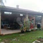 Casa à venda com 4 quartos, sendo 1 suíte,  no condomínio Morada da Praia, Bertioga - SP