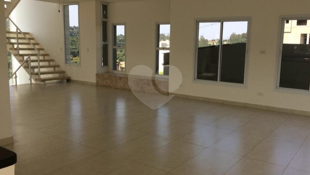 Casa à venda com 4 suítes no condomínio Santa Maria, Cotia - SP