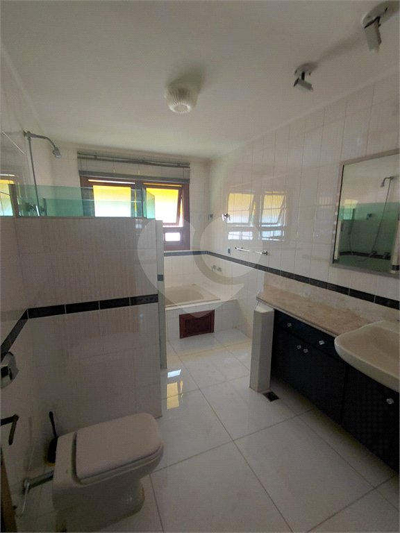 Casa à venda com 4 suítes no condomínio Ville Bourghese, São Paulo - SP