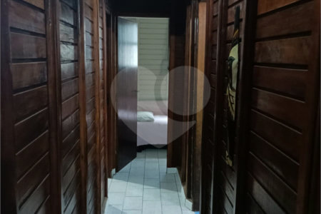 Casa à venda com 4 quartos, sendo 1 suíte,  no condomínio Morada da Praia, Bertioga - SP