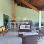 Casa à venda com 4 suítes no condomínio Bougainville, Peruíbe - SP