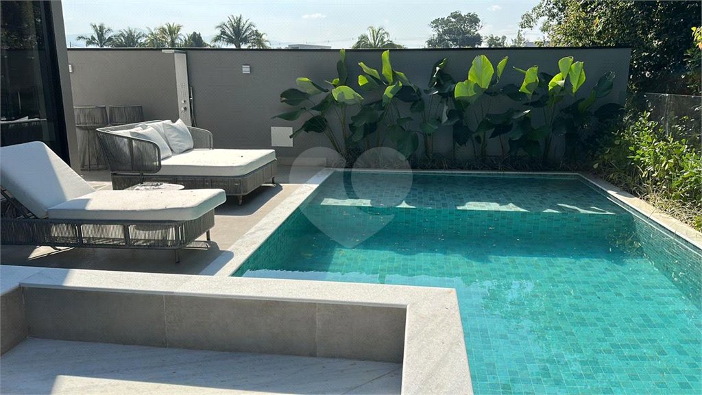 Casa à venda com 6 suítes no condomínio Golf CL, Bertioga - SP