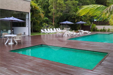 Casa à venda ou para alugar com 4 suítes no condomínio Sambaqui, São Sebastião - SP