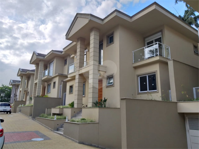 Casa à venda com 4 suítes no condomínio Villagio Di Modena, São Paulo - SP