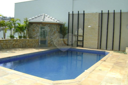 Casa à venda com 3 suítes no condomínio Estância Marambaia, Vinhedo - SP