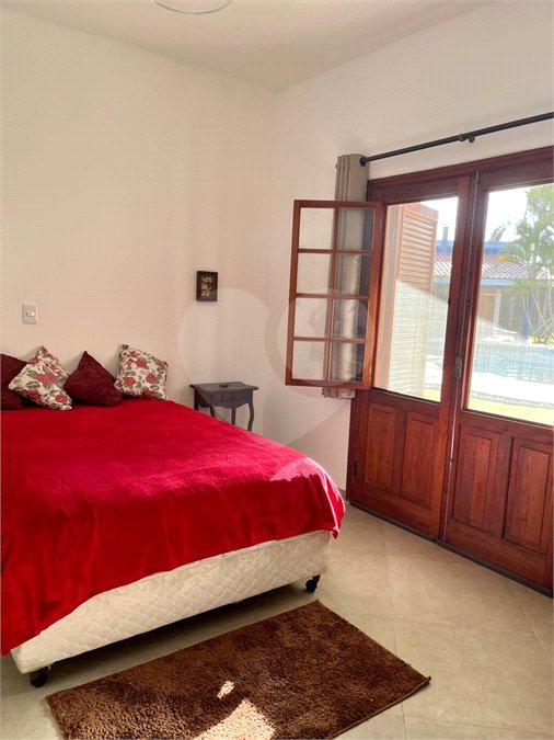 Casa à venda com 4 suítes no condomínio Residencial Vale das Laranjeiras, Indaiatuba - SP