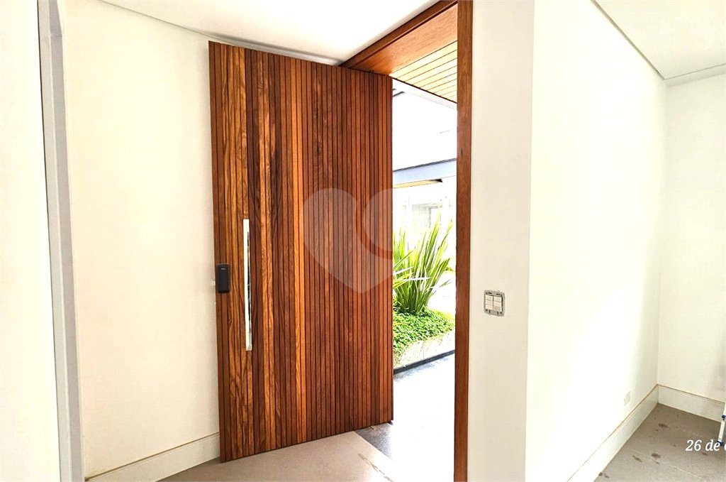 Casa à venda com 4 suítes no condomínio Vila Arese, São Paulo - SP
