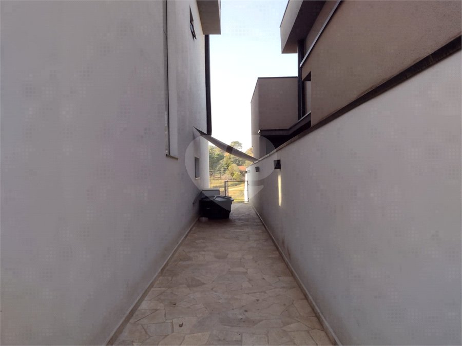 Casa à venda com 4 suítes no condomínio Residencial Villa do Sol, Valinhos - SP