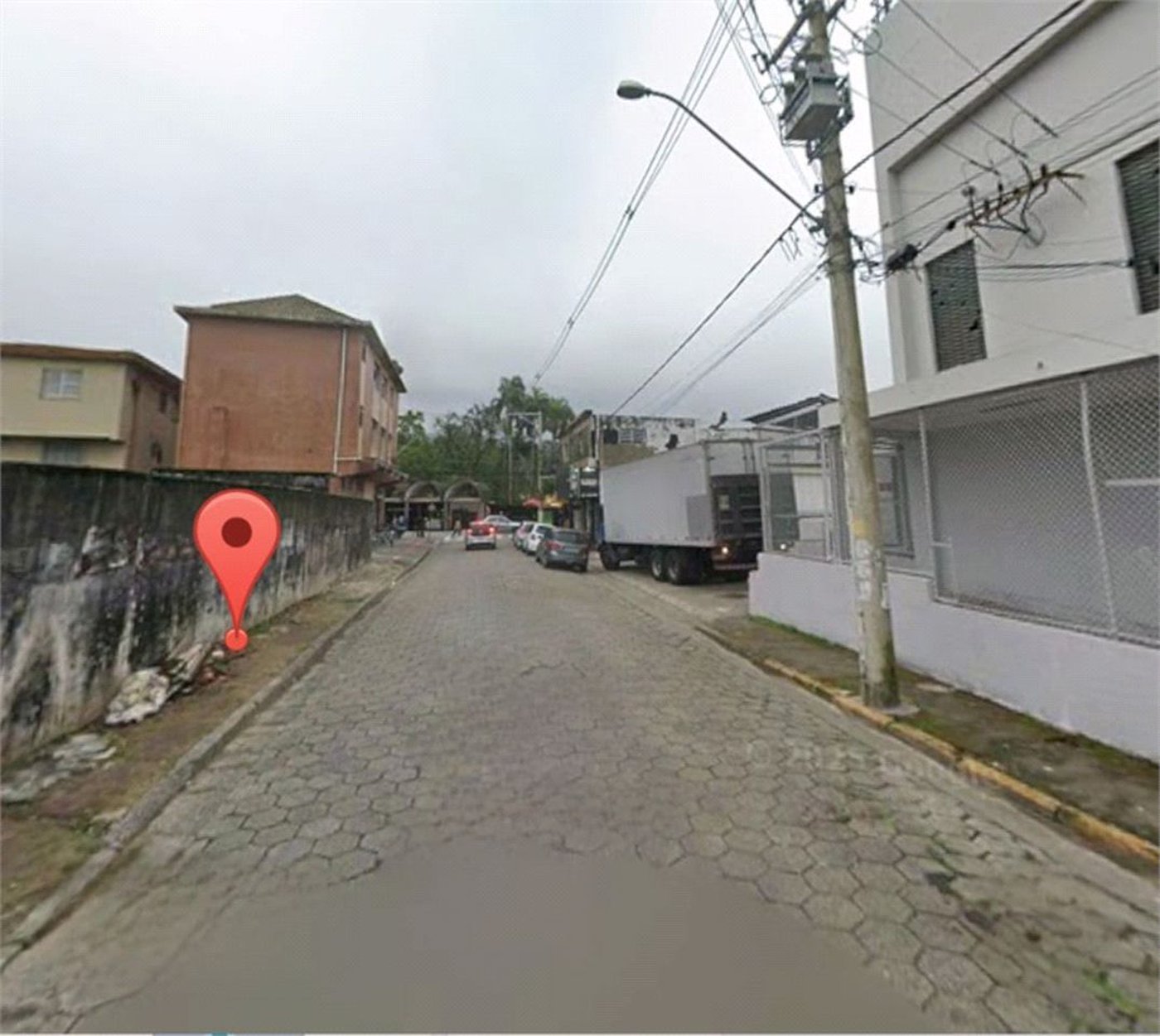 Terreno para alugar, 833 m² por R$ 8.230,00 - Vila Paulista - Cubatão/SP