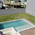 Casa à venda com 4 suítes no condomínio Figueira Garden, Atibaia - SP