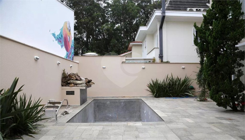 Casa à venda com 4 suítes no condomínio Residencial Morumbi, São Paulo - SP