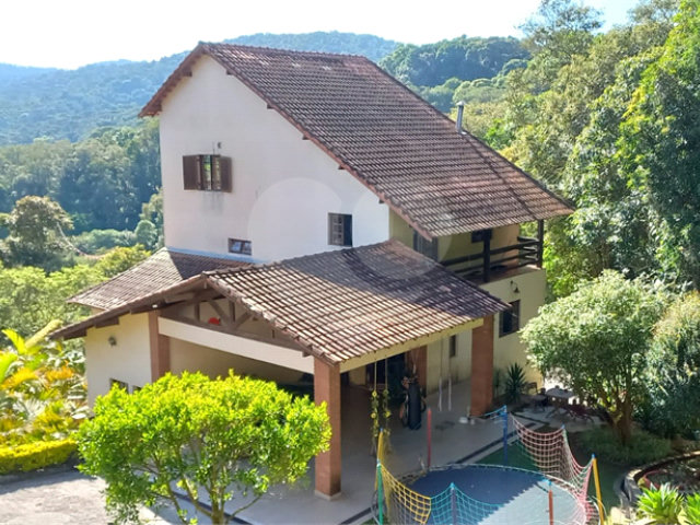 Casa à venda com 4 suítes no condomínio Alpes da Cantareira, Mairiporã - SP