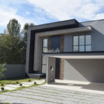 Casa à venda com 4 suítes no condomínio Figueira Garden, Atibaia - SP