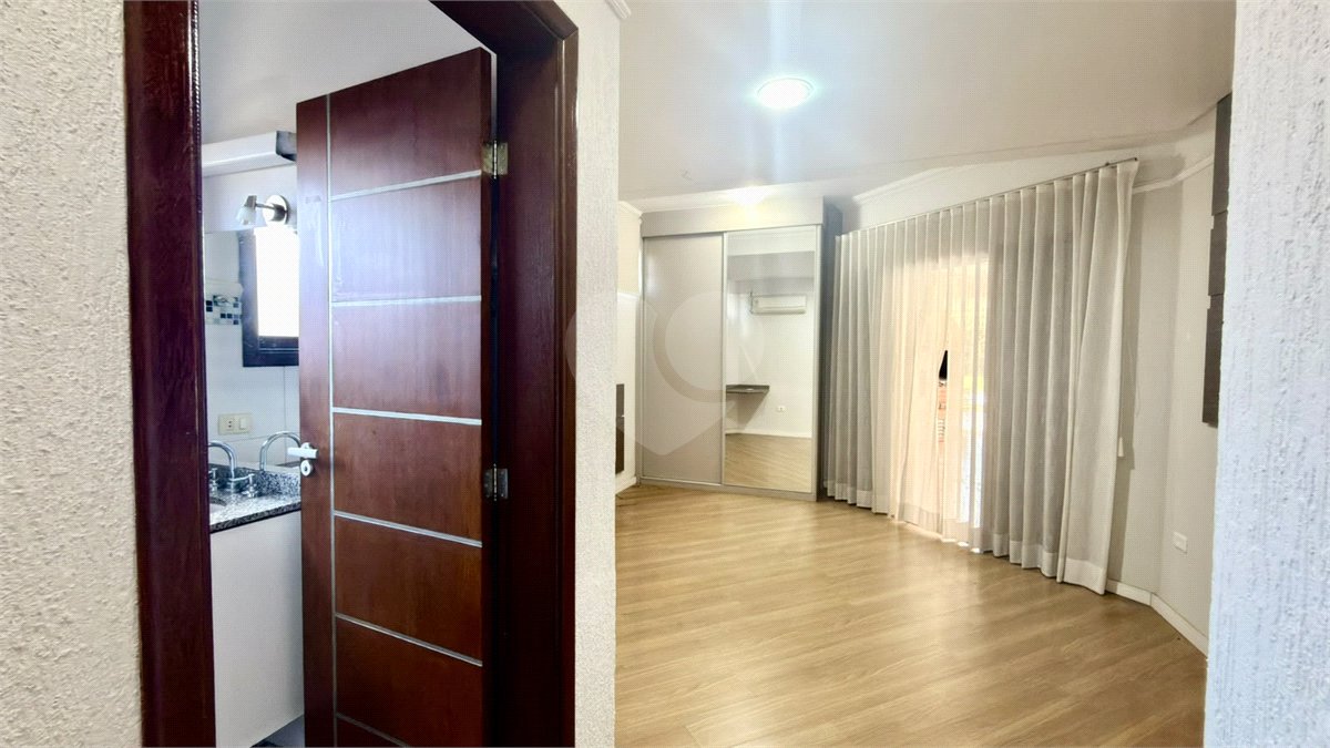 Casa à venda com 4 suítes no condomínio Parque Village Castelo, Itu - SP