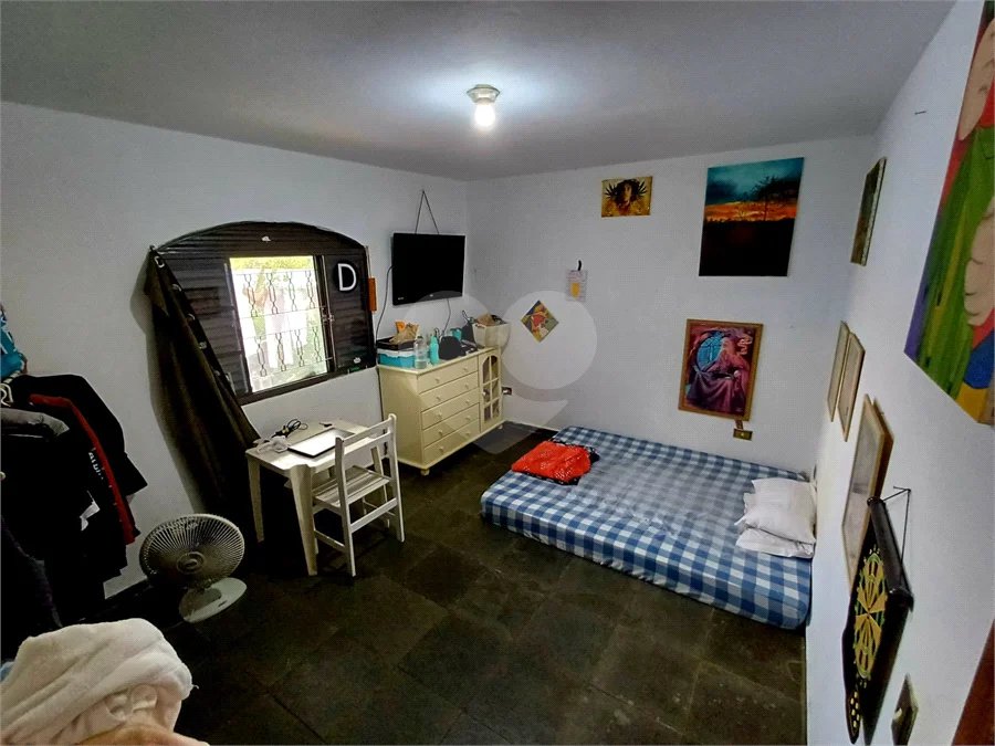Casa à venda em Atibaia com 5 dormitórios (1 suíte), piscina e área gourmet, 2 vagas garagem, avalia permuta e financiamento