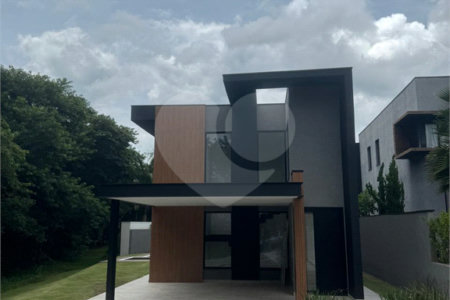 Casa à venda com 4 suítes no condomínio Figueira Garden, Atibaia - SP