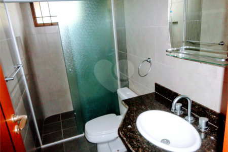 Casa à venda com 4 suítes no condomínio Estância Marambaia, Vinhedo - SP