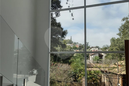 Casa à venda com 4 suítes no condomínio Estância Marambaia, Vinhedo - SP