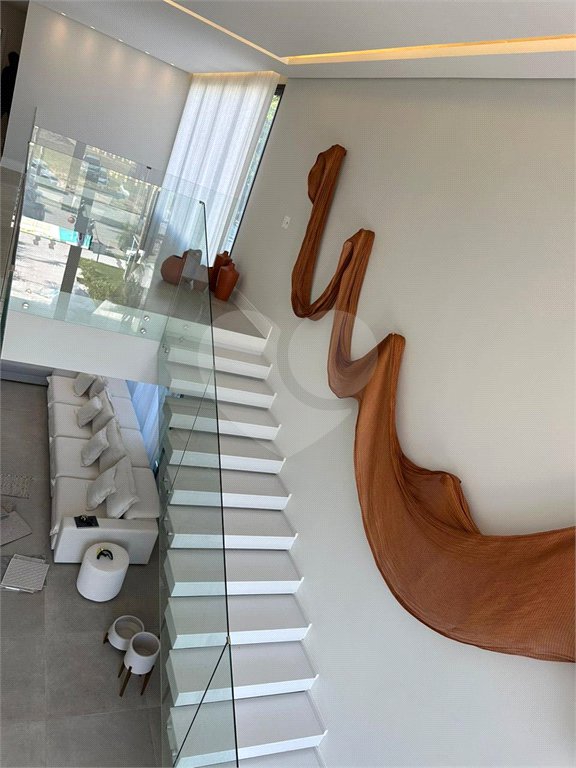 Casa à venda com 6 suítes no condomínio Golf CL, Bertioga - SP