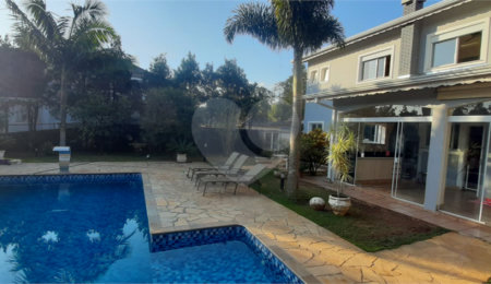 Casa à venda com 4 suítes no condomínio Suíça da Cantareira, Mairiporã - SP