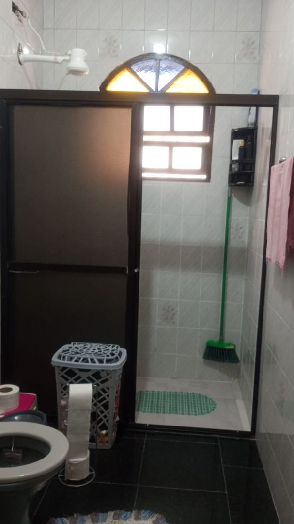 Casa com 3 dormitórios à venda, 140 m² por R$ 425.000,00 - Parque Bitaru - São Vicente/SP
